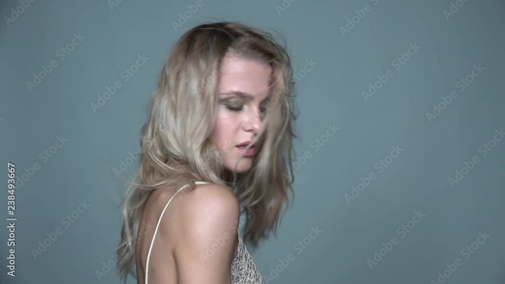 Portrait of beauty young  woman in summer casual dress with shaggy hair