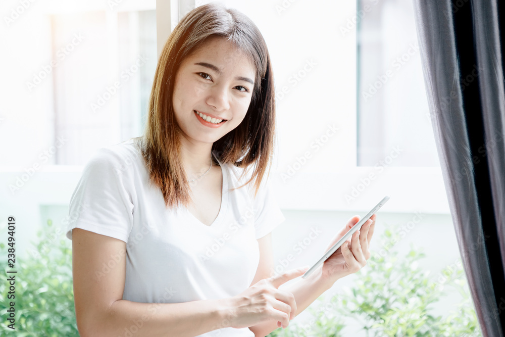 Young asian girl is freelancer with her private business at home office, working with laptop, coffee, online marketing, Customer order and packaging or packing.