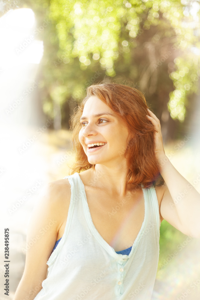 Young beautiful happy smiling woman girl close up, head shot, natural sensual beauty Young beautiful happy smiling woman girl close up, head shot, natural sensual beauty