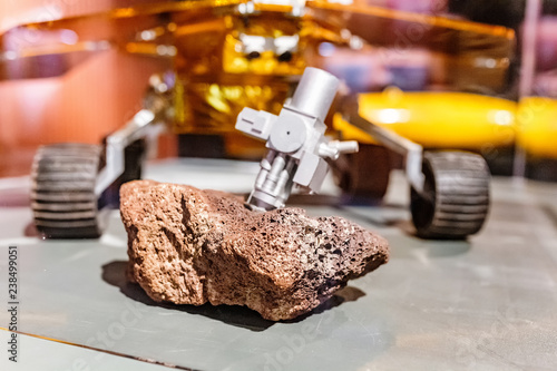 robotic Mars rover with soil sample photo