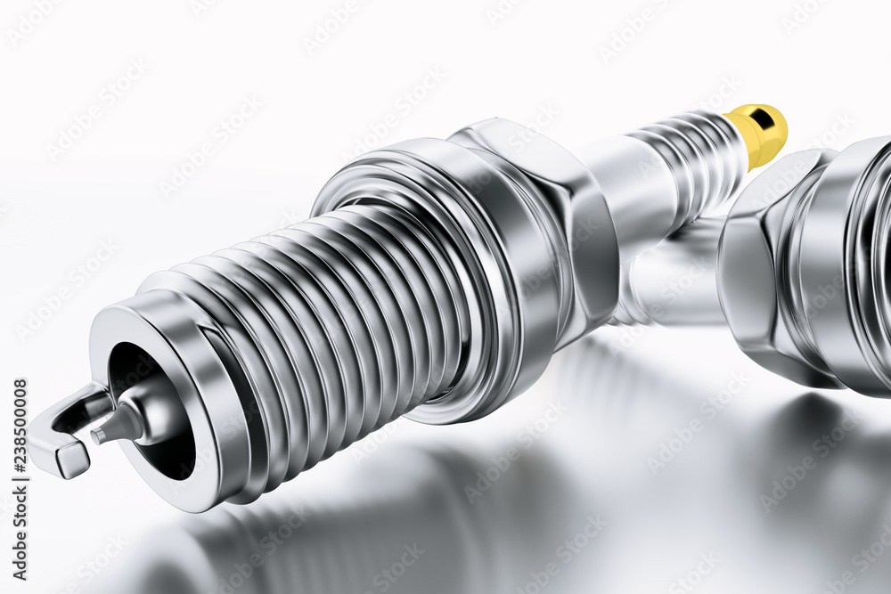 Spare parts spark plugs on white background for car and motorcycle. New auto parts spark plug. Spare parts spark plugs on white background for car and motorcycle. New auto parts spark plug.