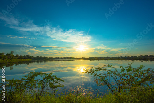 Sunset on lake in the summer   Evening sky Landscape Backgrounds