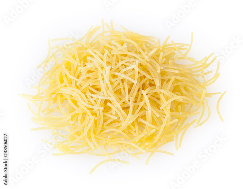Heap of uncooked vermicelli pasta isolated on white background with clipping path