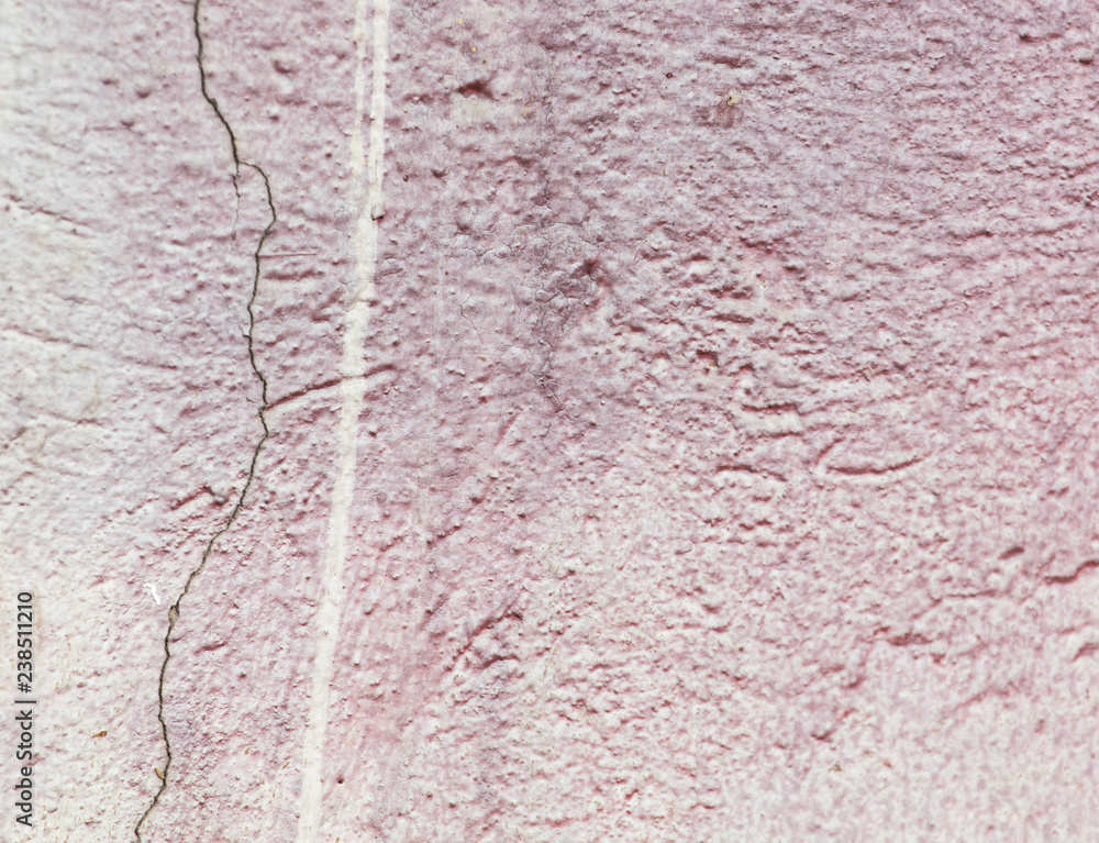 Old wall painted with pink paint as a background