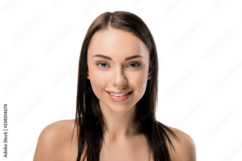 portrait of attractive naked girl smiling at camera isolated on white