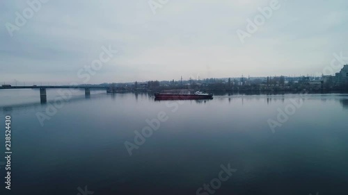 Wallpaper Mural Cargo ship sailing on the river, on its way under the bridge Torontodigital.ca