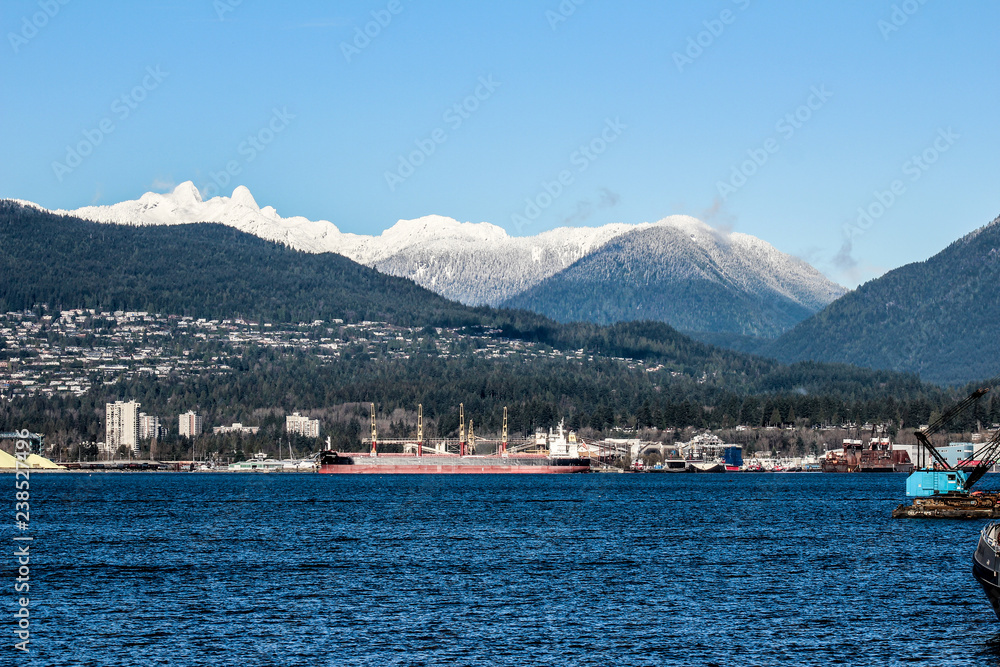 Ocean and mountains and city