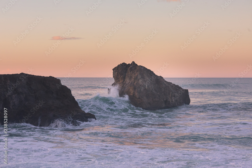 Sea hitting the rocks of Ilbarritz coast at the city of Biarritz, Basque Country,.