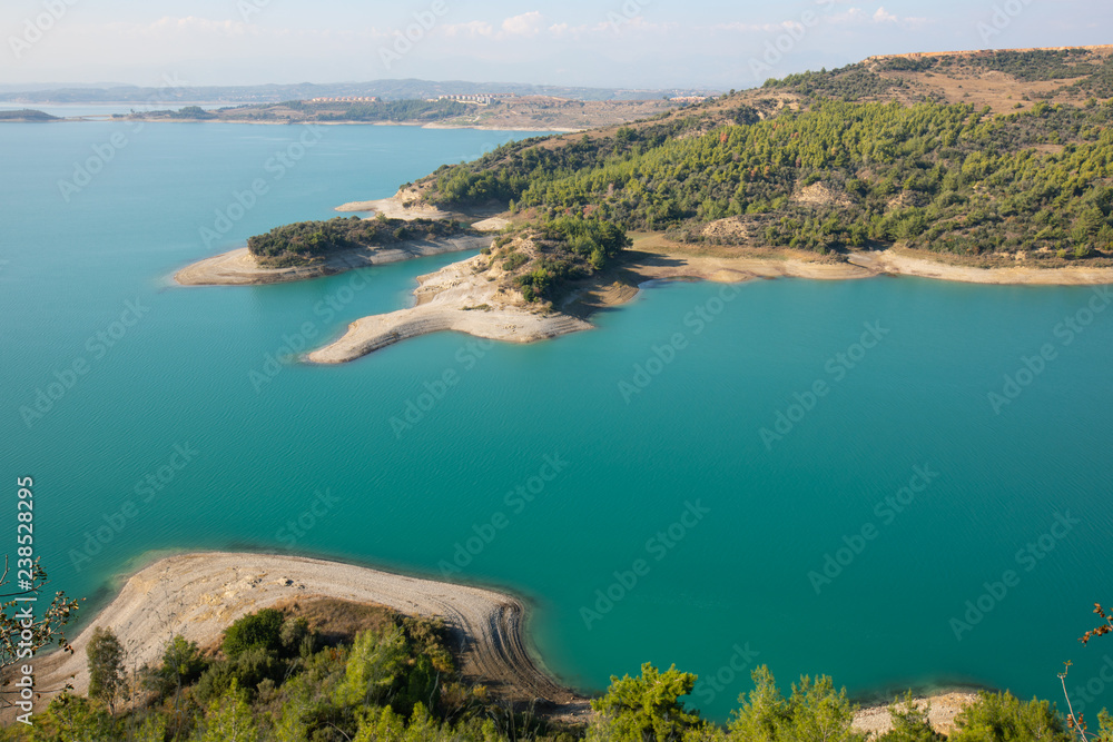 The Seyhan Dam is a hydroelectric dam on the Seyhan River north of Adana, Turkey