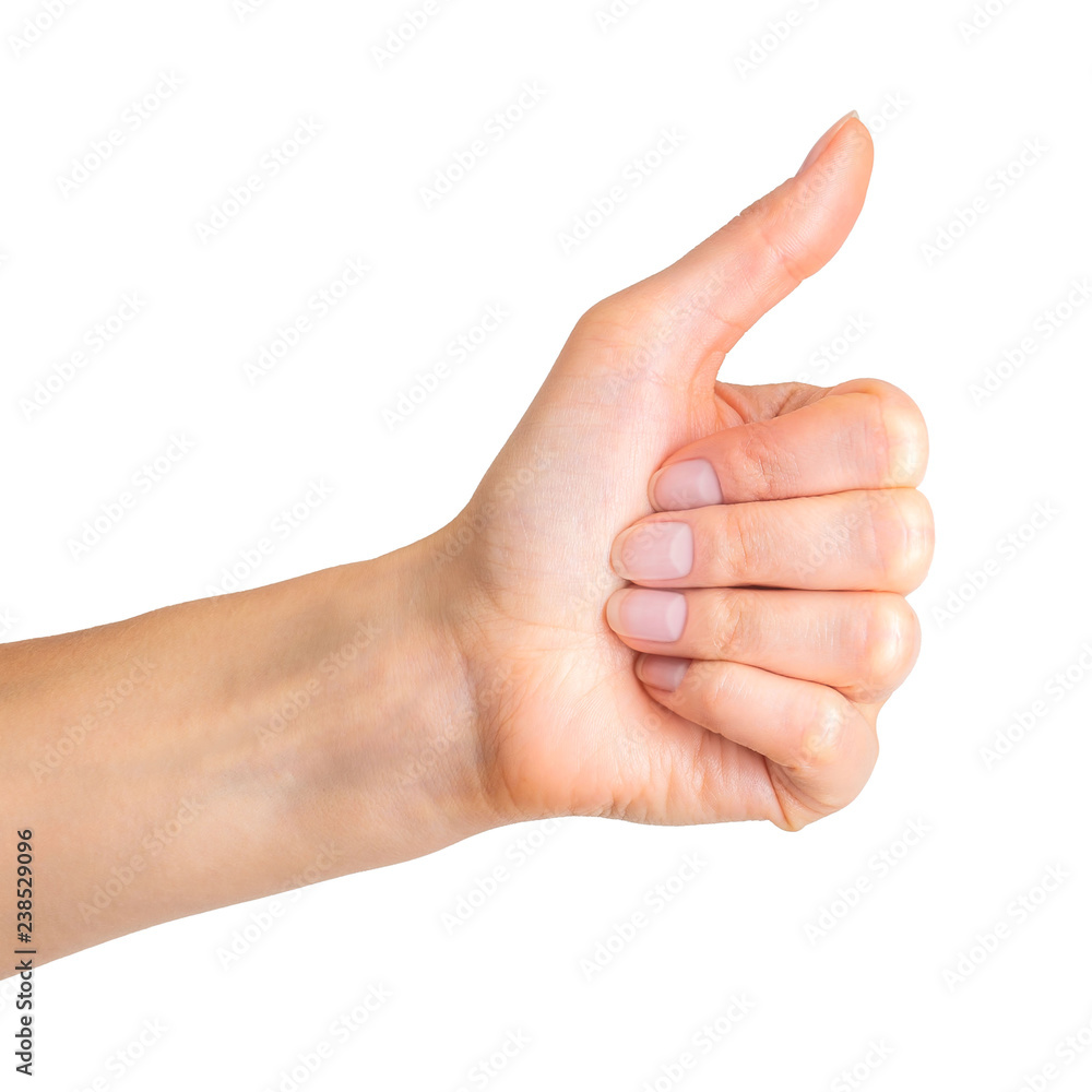 Woman holding hand in gesture of like sign, giving thumb up Woman holding hand in gesture of like sign, giving thumb up