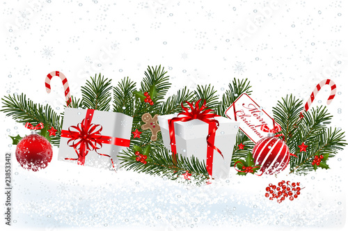 Christmas background with fir branch border with balls, ribbons and Christmas decorations.Decorative Christmas festive background with Christmas presents.