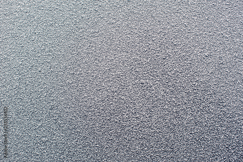 Frozen texture . Snow on the window