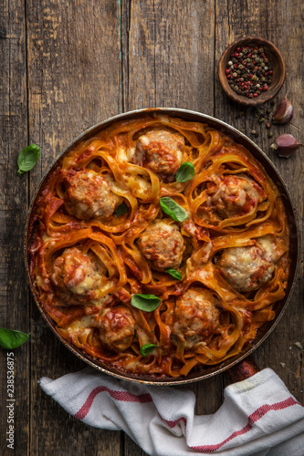 meatballs in pasta nests with tomato sauce