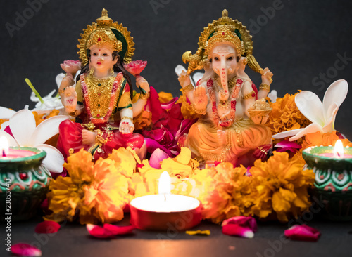 Hindu God Laxmi Ganesh with Candle Light at Diwali Festival