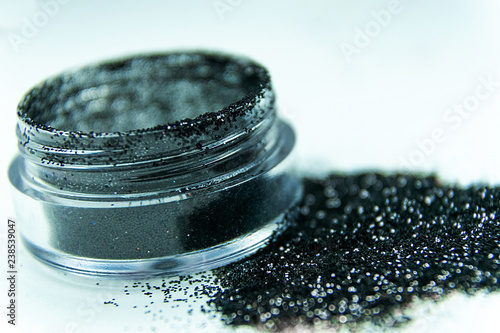 black glitter in a jar.