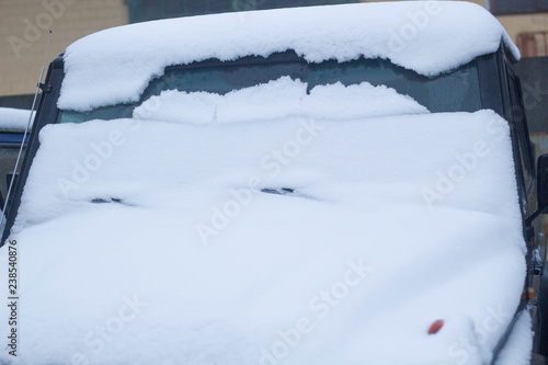 Wallpaper Mural Winter frozen front car window, texture freezing ice glass background Torontodigital.ca
