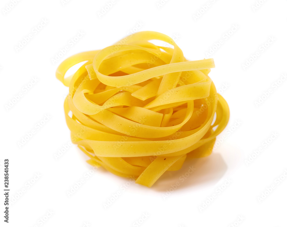 Homemade raw egg noodles on a white background. Homemade raw egg noodles on a white background.