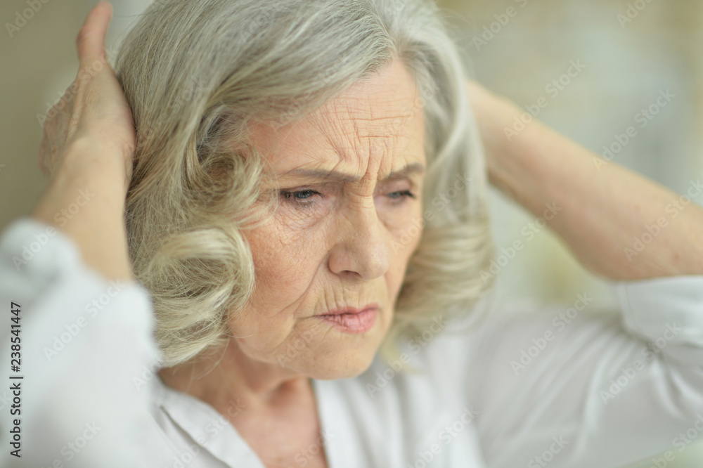 Portrait of beautiful sad senior woman at home Portrait of beautiful sad senior woman at home