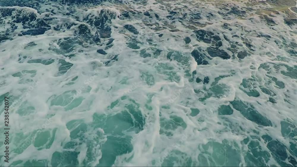 Sea waves in water filmed from above ferry
Sea waves in water filmed from above ferry