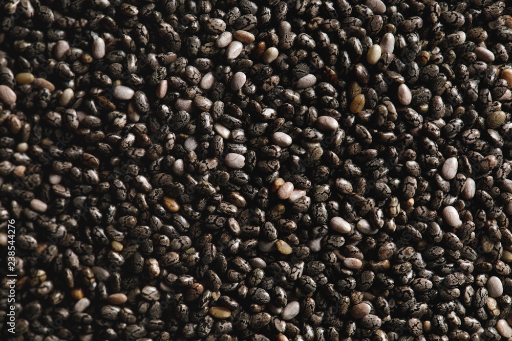 close up of chia seeds as textured background with copy space close up of chia seeds as textured background with copy space