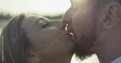 Young married couple kissing