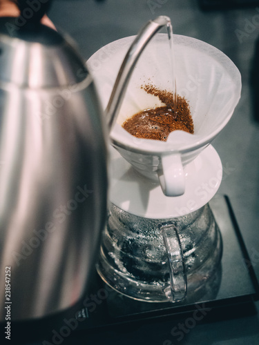 Making pour-over coffee with a hario V60 dripper photo