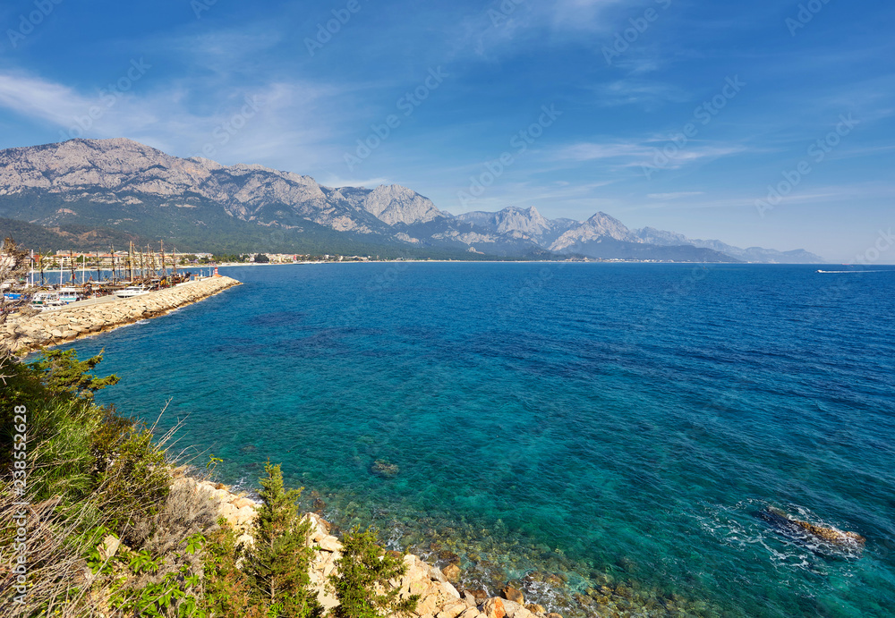 Coast of the Mediterranean Sea with a view on the mountains. Kemer