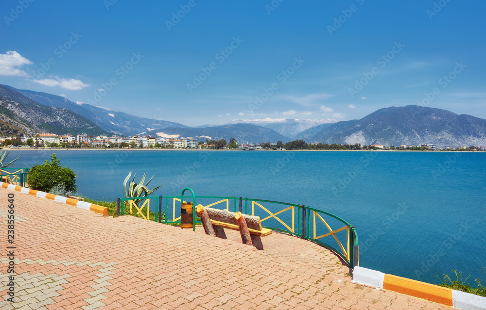 Quay with benches and tables in Finike, province of Antalya.