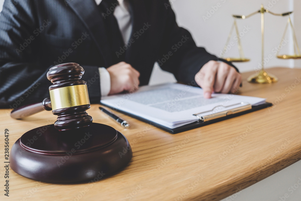 Judge gavel with scales of justice, professional male lawyers or counselor working having at law firm in office. Concepts of law Judge gavel with scales of justice, professional male lawyers or counselor working having at law firm in office. Concepts of law