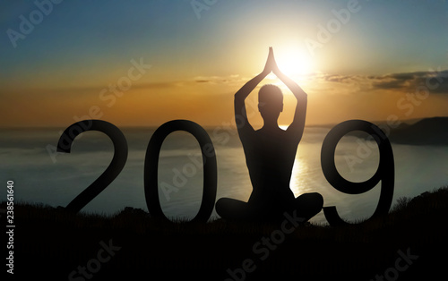 Yoga lifestyle. Happy new year 2019 greeting ard