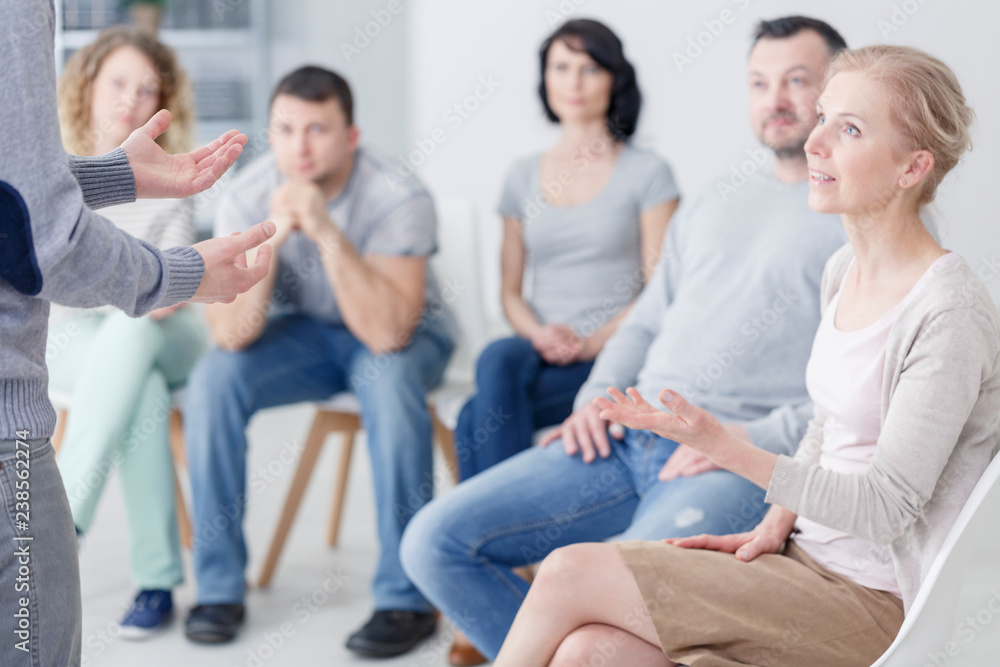 Man talking with woman about problems during therapy for couples Man talking with woman about problems during therapy for couples