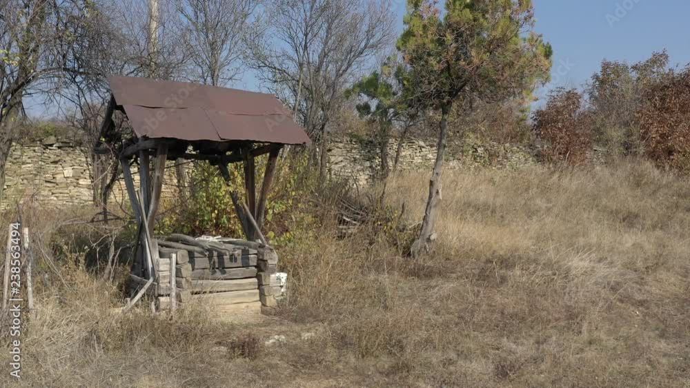 Weathered water well house 4K drone video Weathered water well house 4K drone video