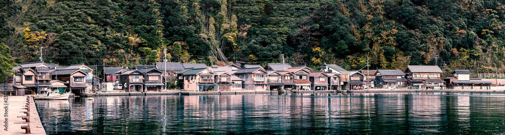 Panorama view of Ine-Cho and Funaya houses at Ine bay in Autumn , Kyoto, Japan