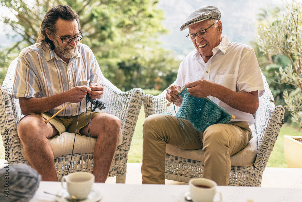 Retired male friends doing knitting Retired male friends doing knitting