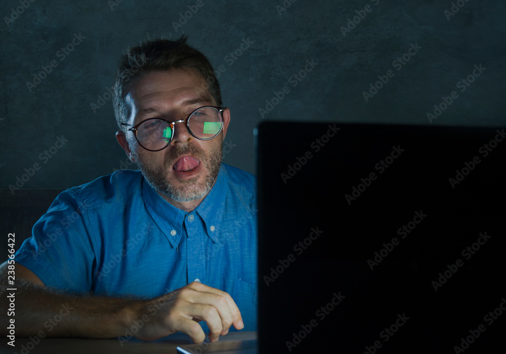 lascivious aroused porn addict man in nerd glasses watching sex movie  online late night at laptop computer looking pervert and horny in internet  pornography sex content Stock Photo | Adobe Stock
