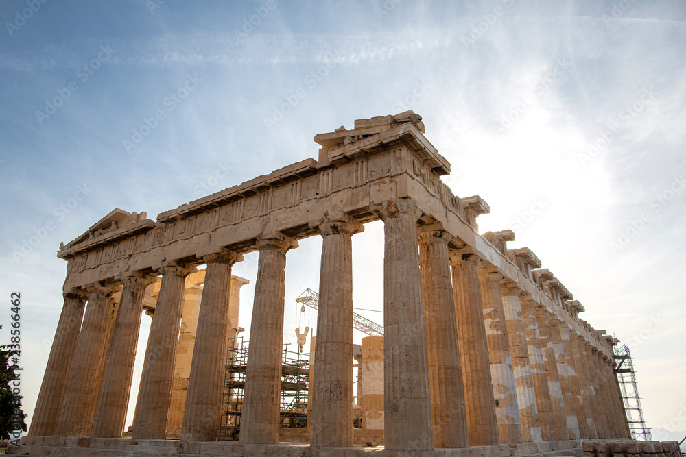 Parthenon on Acropolis, Athens, Greece. It is a main tourist attraction of Athens. Ancient Greek architecture of Athens in summer. Ruins of a famous landmark of Athens on the top of Acropolis hill.. Parthenon on Acropolis, Athens, Greece. It is a main tourist attraction of Athens. Ancient Greek architecture of Athens in summer. Ruins of a famous landmark of Athens on the top of Acropolis hill..