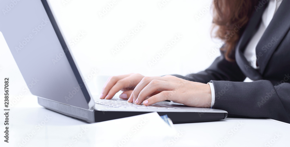 Woman working at home office hand on keyboard close up Woman working at home office hand on keyboard close up