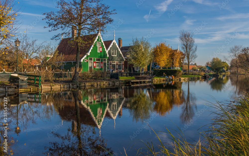 Obraz premium Zaanse Schans, Netherlands - considered a real open air museum, Zaanse Schans presents a collection of well-preserved historic windmills and houses