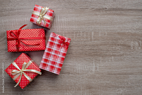 Christmas gift box on wood.