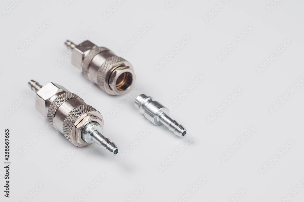 Adapter quick-set mom-dad for pneumatic systems on a white background Adapter quick-set mom-dad for pneumatic systems on a white background