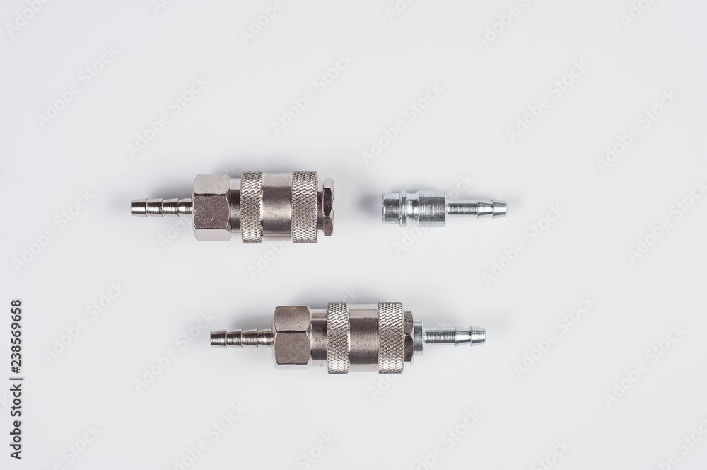 Adapter quick-set mom-dad for pneumatic systems on a white background Adapter quick-set mom-dad for pneumatic systems on a white background