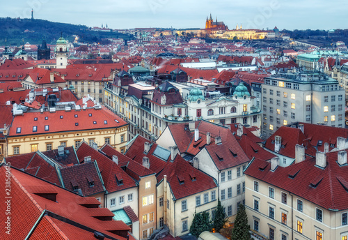 Aerial view over Prague from Old town hall tower at dusk. Beautiful travel background.