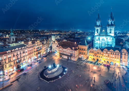 Aerial view on Old town with Tyn church in Prague, Czech republic, at night. Colourful skyline.