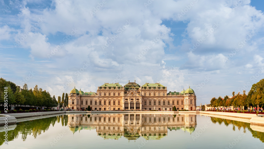 Gorgeous Belvedere palace reflecting in a pond. Sunny day in Vienna, Austria.