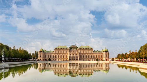 Gorgeous Belvedere palace reflecting in a pond. Sunny day in Vienna, Austria.