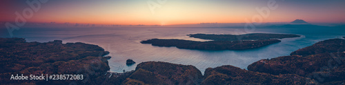 Фотография Sunset panoramic overview of Indonesia shoreline and ocean