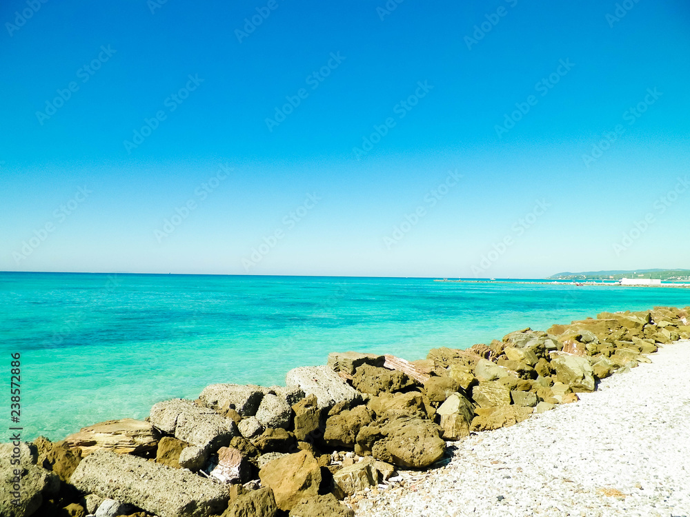 Breakwater on beach in Vada, Italy. Breakwater on beach in Vada, Italy.