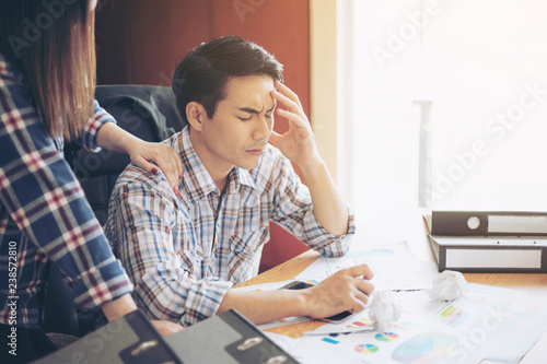 Canvas Print business man is stressed from work , friend come to consolation , document paper
