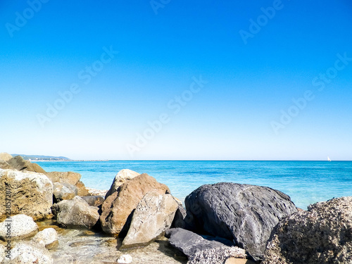 Stones on beach in Vada, Italy.