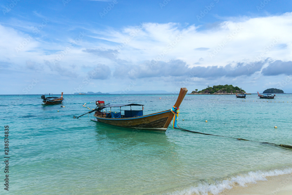 Long-tailed boat on Sunrise Beach, Koh LIPE, Satun, Thailand. Long-tailed boat on Sunrise Beach, Koh LIPE, Satun, Thailand.